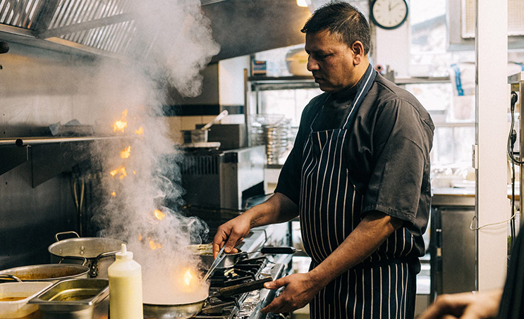 Chef preparing curry